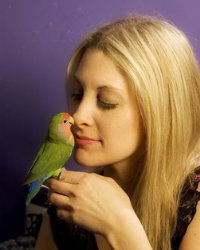 Nikki Moustaki and parrot