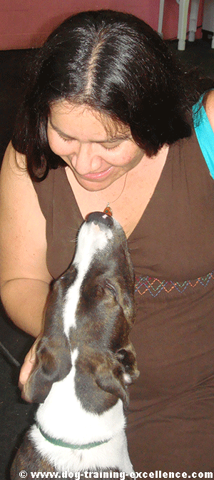 woman and dog looking at each other, dog love